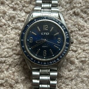 LTD men’s‎ vintage blue/silver watch fits a medium-large sized wrist